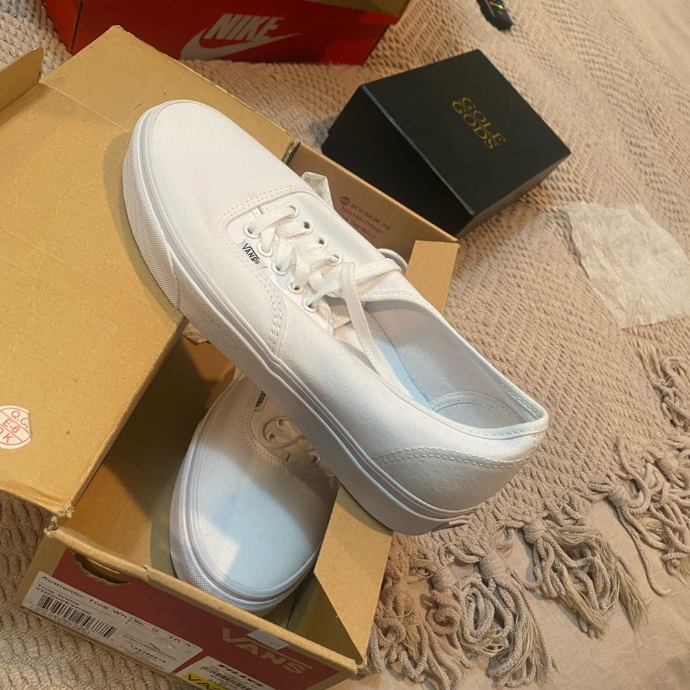 NIB white vans